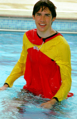 lifeguard in the water with clothes