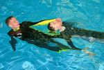 RESCUE, TOWING, EXTENDED ARM TOW
Swim sidestroke and keep face of the casualty well out of the water 2
